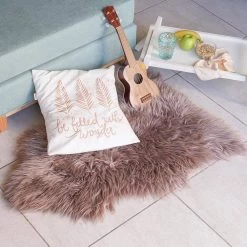 Unshorn Sheepskin Beige 2 ft. x 3 ft. Animal Shape Area Rug by Home Decorators Collection -Home Decorators Store beige home decorators collection area rugs l201040100o2100 31 1000