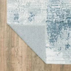 Harmony Machine Washable Blue 7 ft. 6 in. x 10 ft. Abstract Polyester Indoor Area Rug by Home Decorators Collection 13 Harmony Machine Washable Blue 7 ft. 6 in. x 10 ft. Abstract Polyester Indoor Area Rug by Home Decorators Collection -Home Decorators Store blue home decorators collection area rugs 592463 66 1000