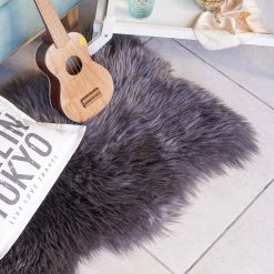 Unshorn Sheepskin Grey 2 ft. x 3 ft. Animal Shape Area Rug by Home Decorators Collection -Home Decorators Store grey home decorators collection area rugs l201470000o2600 1d 1000